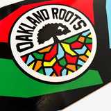 Detailed Oakland Roots Crest logo on skateboard deck.