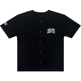 Black button-up baseball jersey with white OAKLAND ROOTS SC wordmark on the left chest.